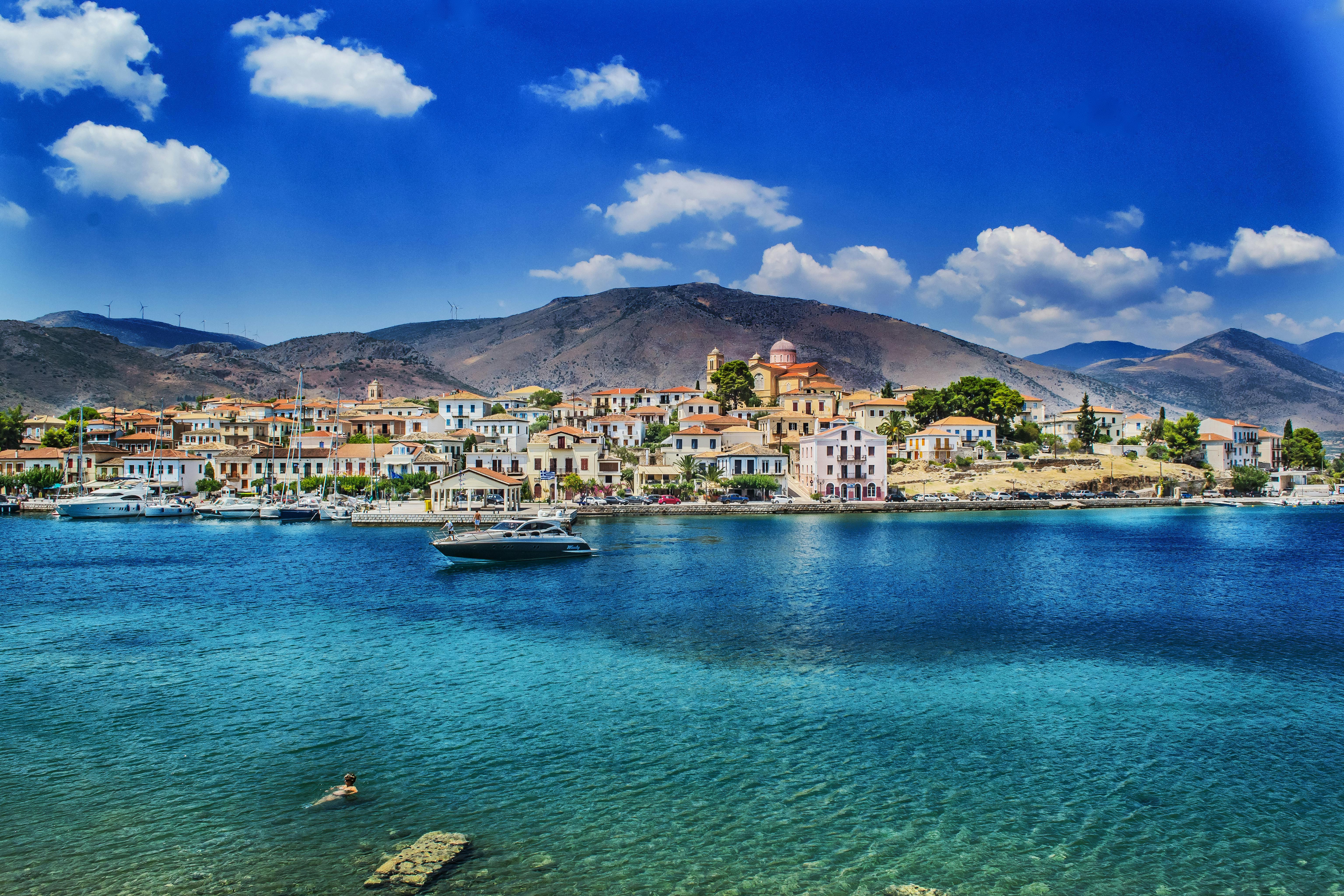 A sunny view of a small coastal town in the Mediterranean
